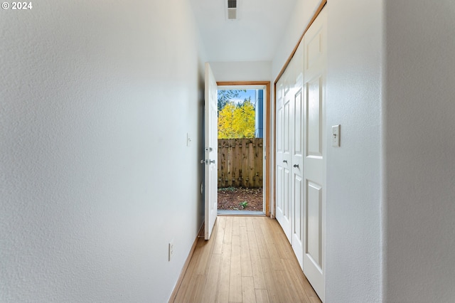 hallway featuring light hardwood / wood-style flooring