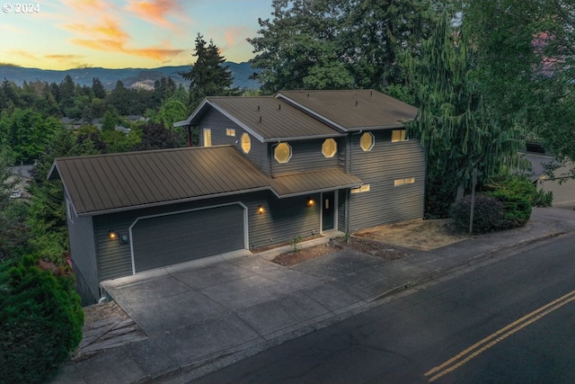 view of front of property featuring a garage