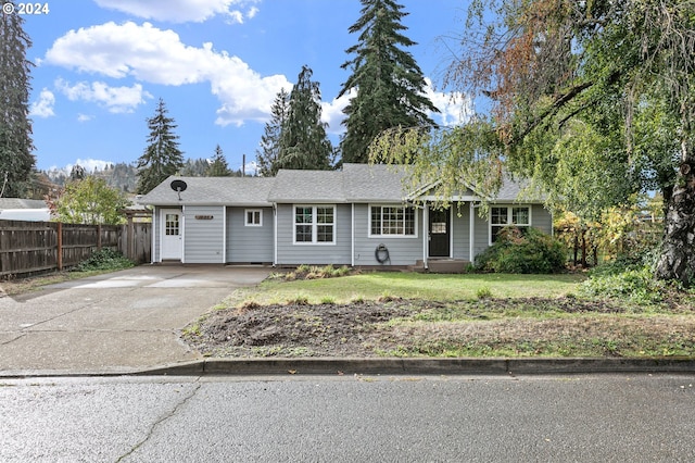 ranch-style house with a front yard