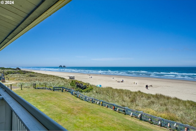 view of water feature with a beach view