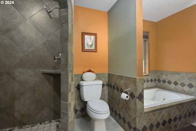 bathroom featuring tile patterned floors, plus walk in shower, tile walls, and toilet