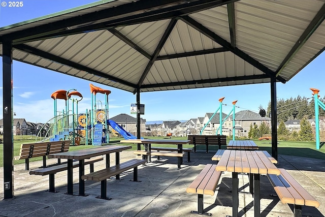 exterior space with a gazebo, a residential view, and playground community