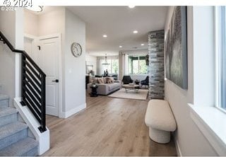 entryway with light hardwood / wood-style floors