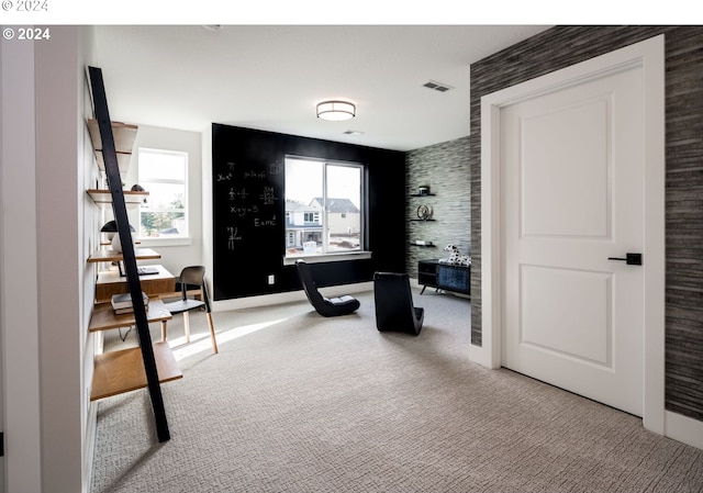 hallway featuring carpet floors