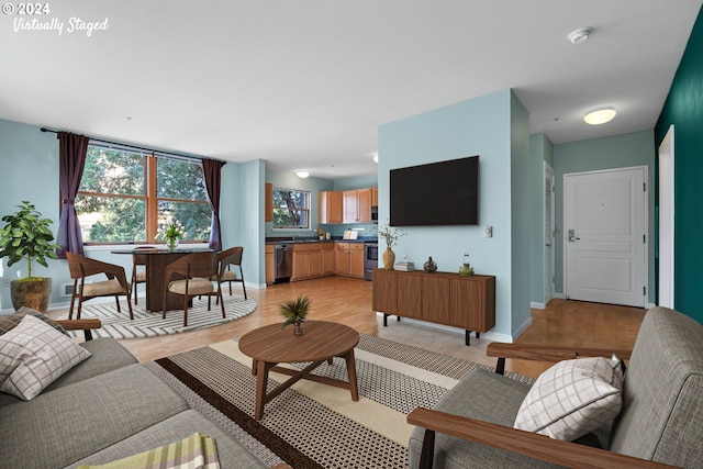 living room with light hardwood / wood-style flooring