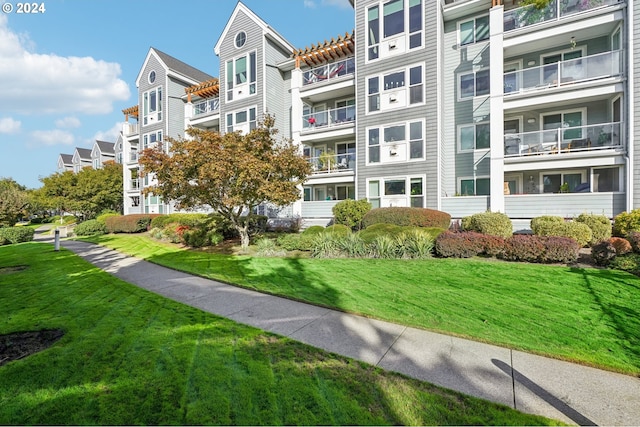 view of community with a lawn