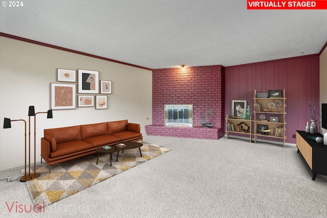 carpeted living room featuring ornamental molding, a brick fireplace, a textured ceiling, and wood walls