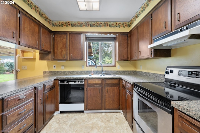 kitchen with dishwasher, a healthy amount of sunlight, sink, and stainless steel electric range oven