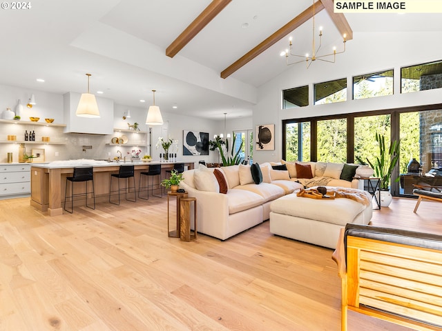 living room featuring a notable chandelier, light wood-type flooring, beam ceiling, and high vaulted ceiling