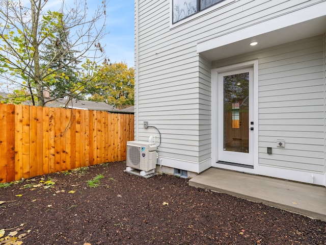 doorway to property with ac unit