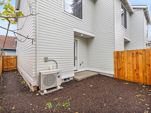 view of property exterior with ac unit