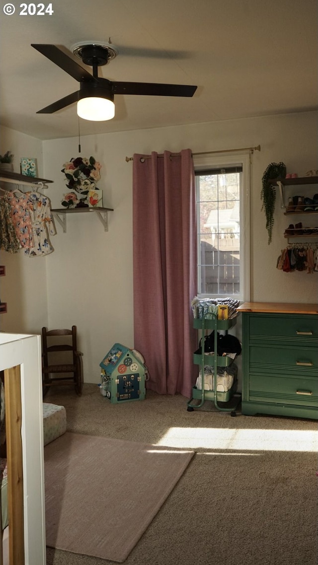 bedroom featuring carpet flooring and ceiling fan