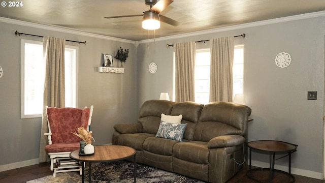 living room featuring ceiling fan, dark hardwood / wood-style floors, and ornamental molding