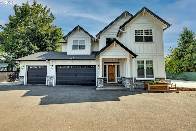 craftsman inspired home featuring a garage