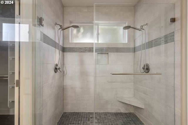 bathroom with an enclosed shower