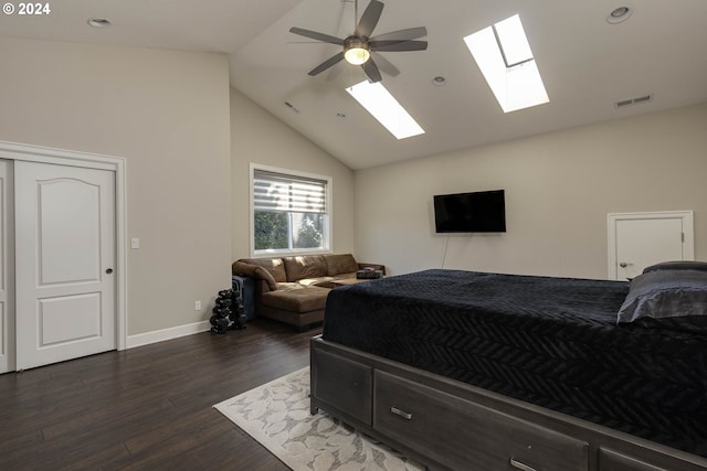 bedroom with dark wood-type flooring, ceiling fan, and high vaulted ceiling