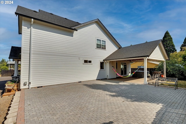 rear view of house featuring a patio area