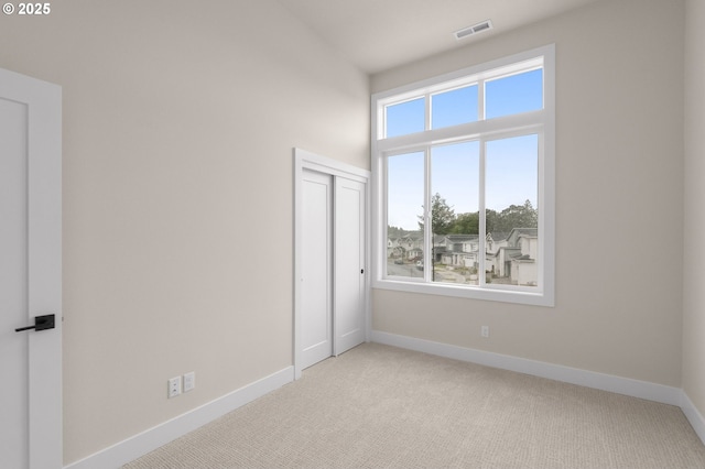 12020 SW Trask St Unit Lt95, Beaverton, OR 97007 - unfurnished bedroom featuring carpet flooring and a closet