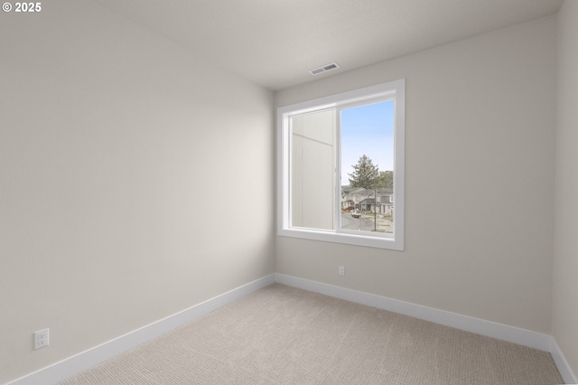 12020 SW Trask St Unit Lt95, Beaverton, OR 97007 - unfurnished room featuring baseboards and light carpet