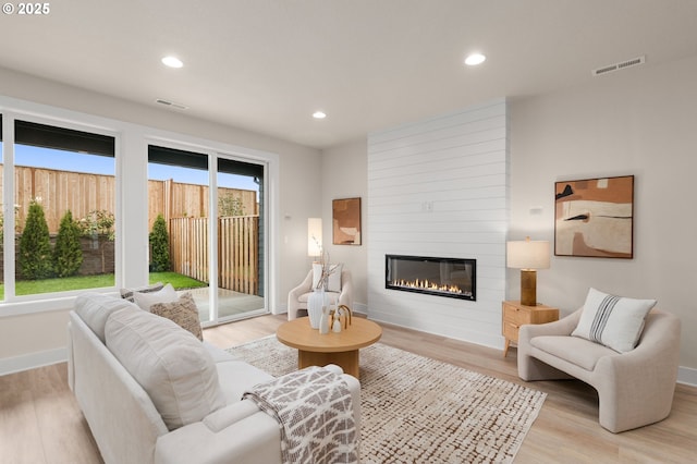 12020 SW Trask St Unit Lt95, Beaverton, OR 97007 - living area with a fireplace, light wood finished floors, and recessed lighting