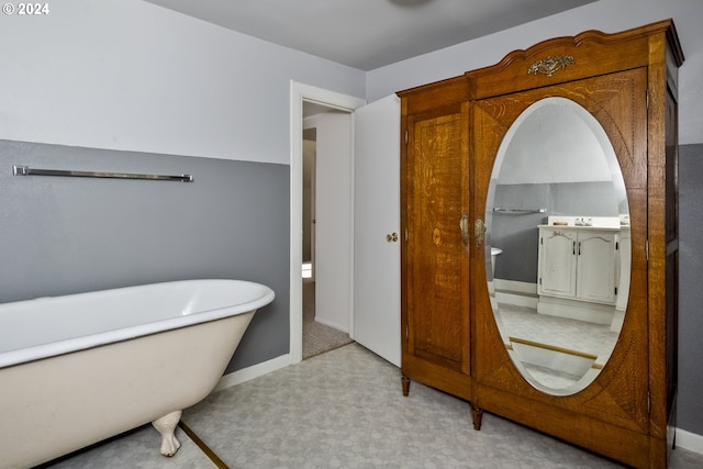 bathroom featuring a bathtub and vanity