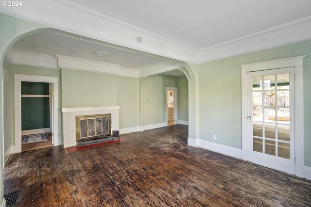 unfurnished living room featuring dark hardwood / wood-style flooring