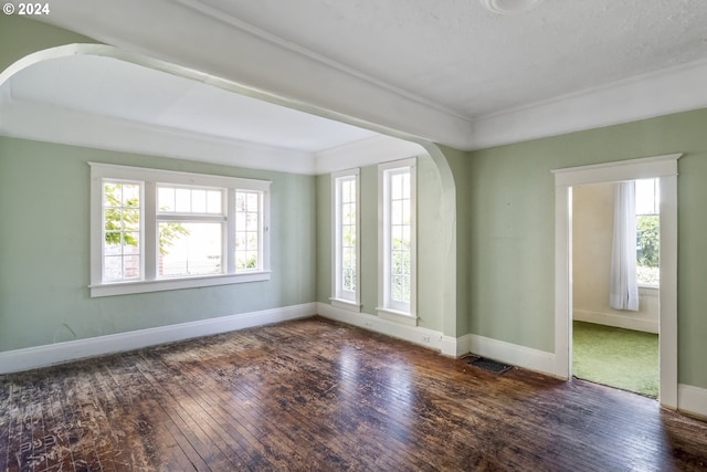 unfurnished room featuring dark hardwood / wood-style floors