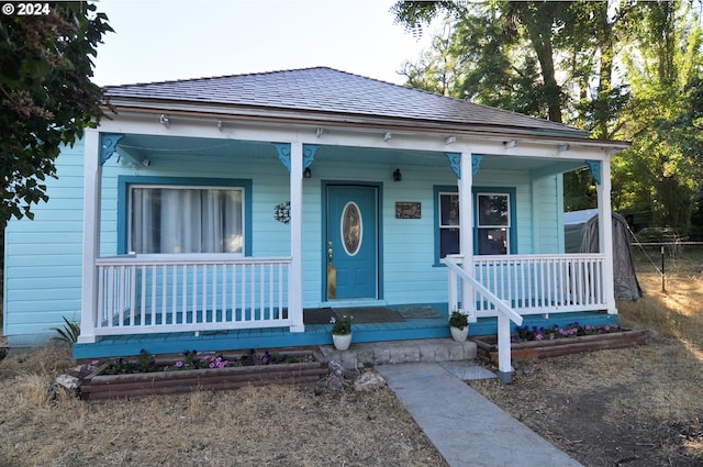 bungalow-style house featuring covered porch