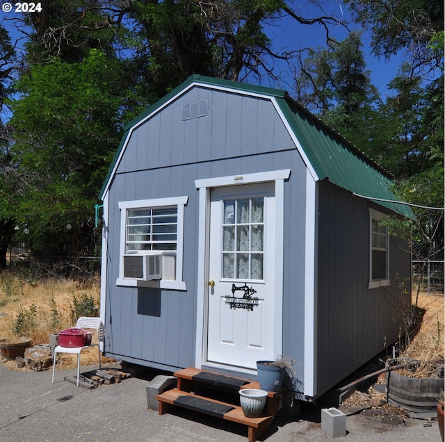 view of outdoor structure featuring cooling unit