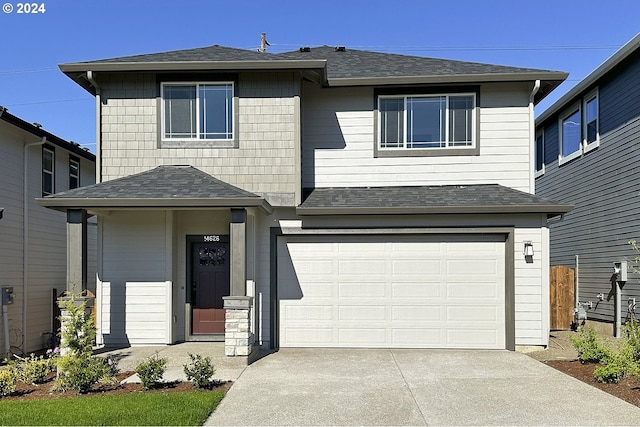 view of front property with a garage