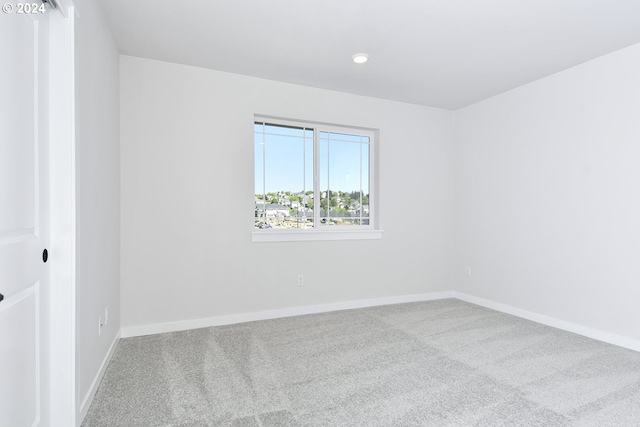 empty room featuring carpet flooring