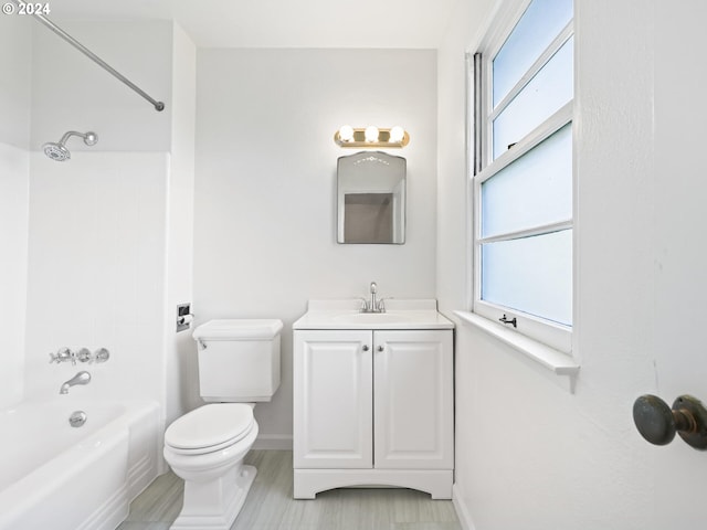 full bathroom with vanity,  shower combination, and toilet