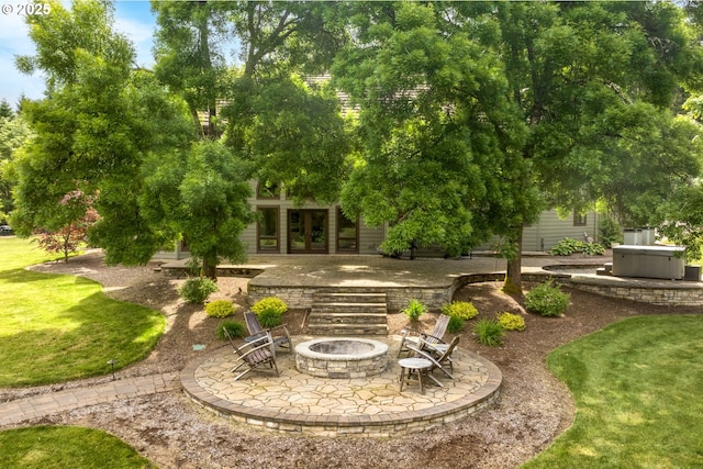33280 NE Haugen Rd, Newberg, OR 97132 - view of green lawn with french doors, a fire pit, and a patio area