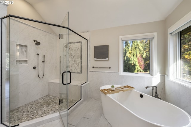33280 NE Haugen Rd, Newberg, OR 97132 - bathroom featuring a soaking tub, a shower stall, tile walls, a wainscoted wall, and vaulted ceiling