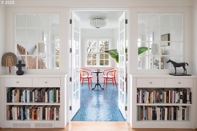 doorway to outside with wood finished floors