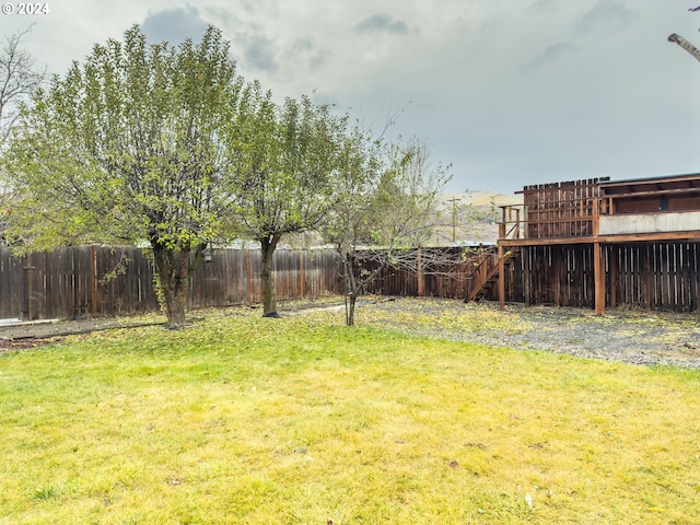 view of yard with a wooden deck