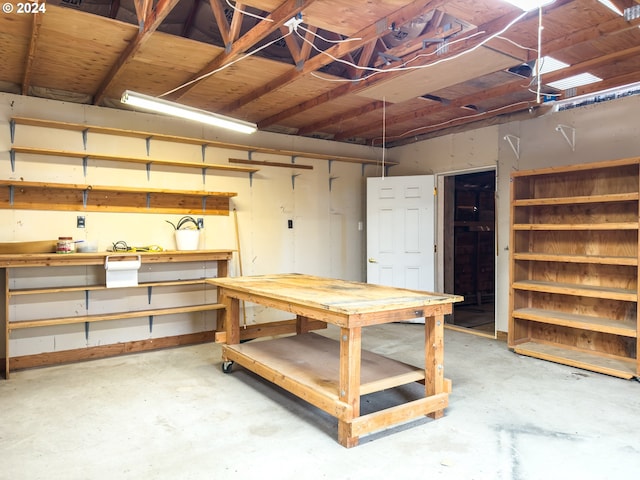 basement with a workshop area