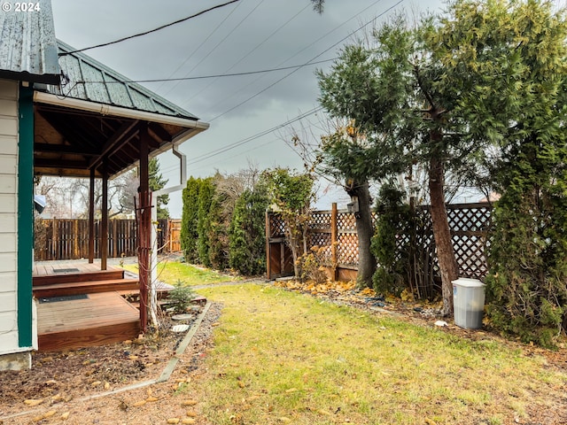 view of yard with a deck