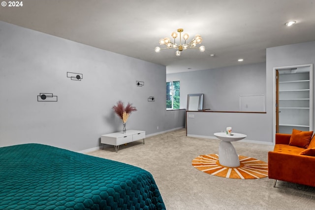 bedroom with carpet and an inviting chandelier