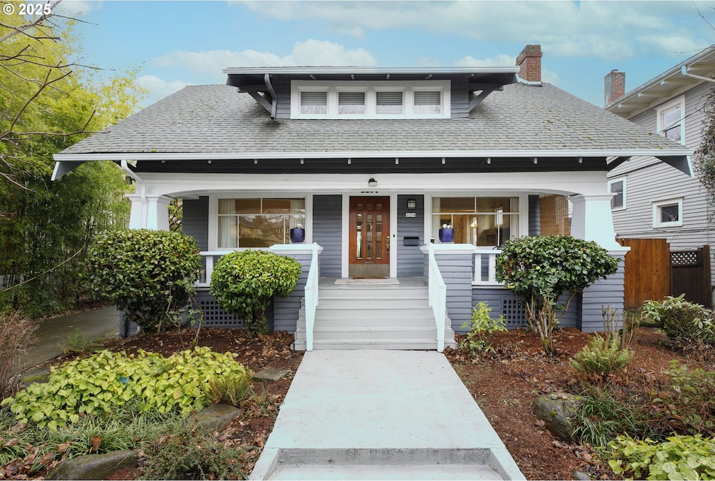 view of front of home featuring covered porch