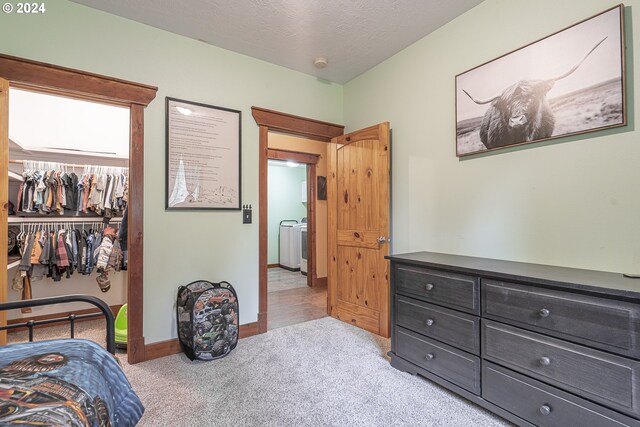 kitchen with vaulted ceiling, decorative light fixtures, stainless steel refrigerator with ice dispenser, ceiling fan with notable chandelier, and light hardwood / wood-style floors