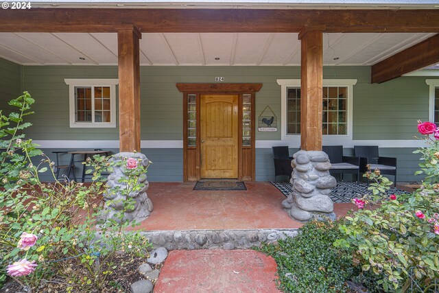 property entrance with a porch