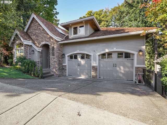 view of front of home with a garage