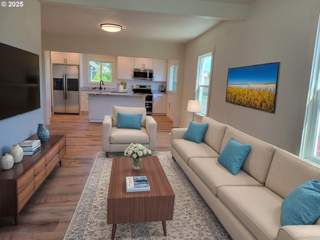 80 S 21st St, Saint Helens, OR 97051 - living room featuring light wood-type flooring and beamed ceiling
