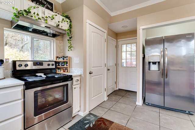 89329 Old Mohawk Rd, Springfield, OR 97478 - kitchen featuring stainless steel appliances, under cabinet range hood, light countertops, white cabinets, and crown molding