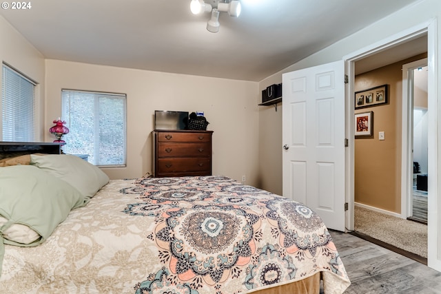 bedroom with light hardwood / wood-style flooring