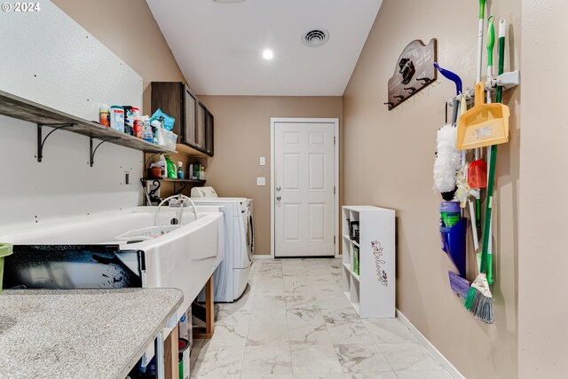 89329 Old Mohawk Rd, Springfield, OR 97478 - clothes washing area with washing machine and clothes dryer, light marble finish floors, and baseboards