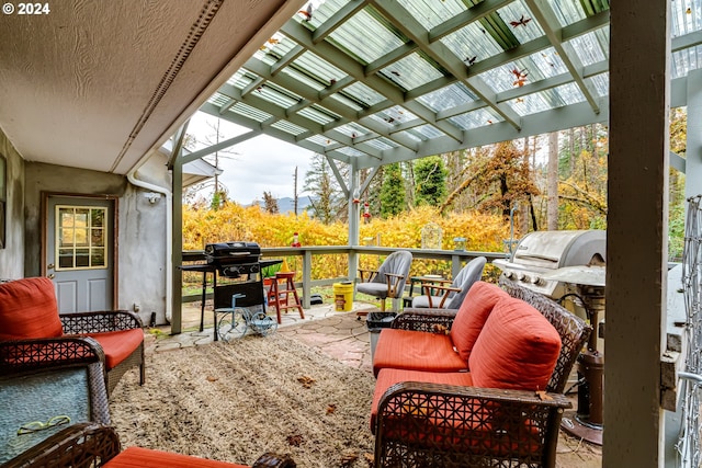 view of patio / terrace with a pergola and grilling area