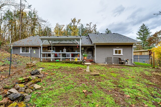 89329 Old Mohawk Rd, Springfield, OR 97478 - back of property with fence and stucco siding