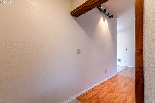 unfurnished room featuring wood-type flooring